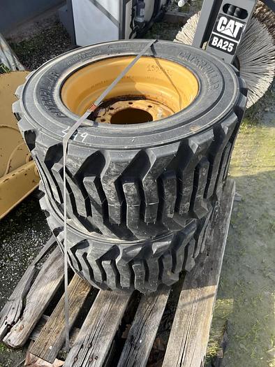 Tyres with rims Caterpillar 31x15.50-16.5